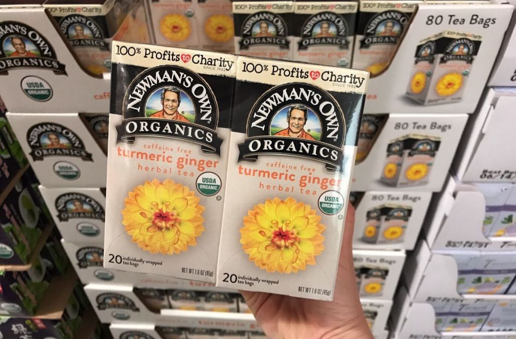 packages of newmans own organic turmeric ginger tea